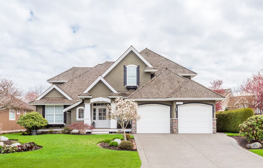 Beautiful suburban family home representing homeownership achieved through expert mortgage guidance